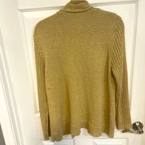 Chico sweater cardigan.  Has soft feel.   Acrylic Cotton Poly.  48”